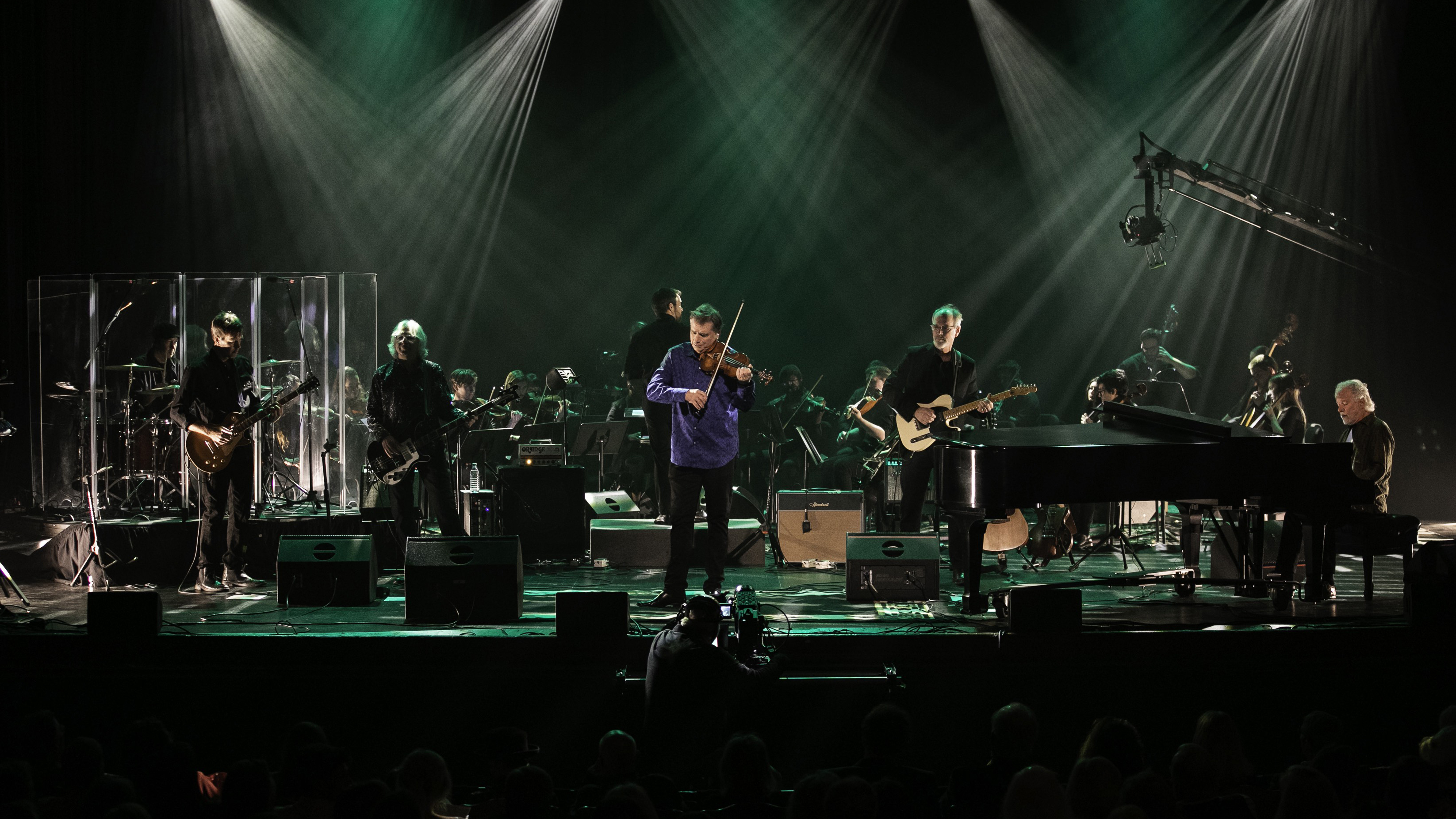 Gerry Hansen, John Neff, Mike Mills, Ward Stare, Robert McDuffie, William Tonks and Chuck Leavell on stage during A Night of Georgia Music at The Grand Opera House in Macon, Ga. Photo credit: Christopher Ian Smith.